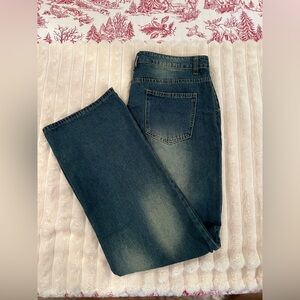 New jeans with button details on front pockets